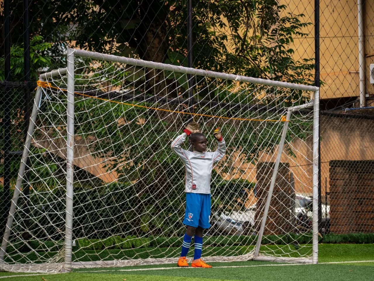 Young goalkeeper ready in goal