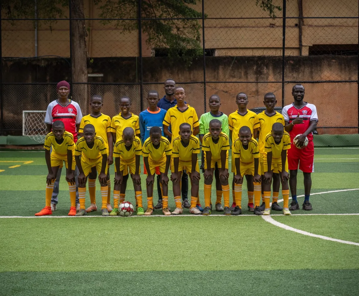Yellow team group photo with coaches