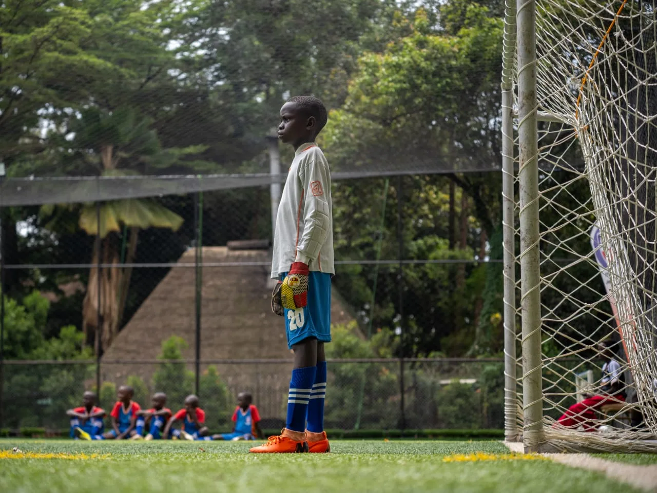 Goalkeeper standing by the post during training